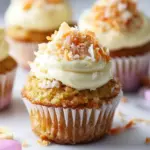 Homemade Banana Carrot Cupcakes with Coconut Cream Cheese Frosting. photo