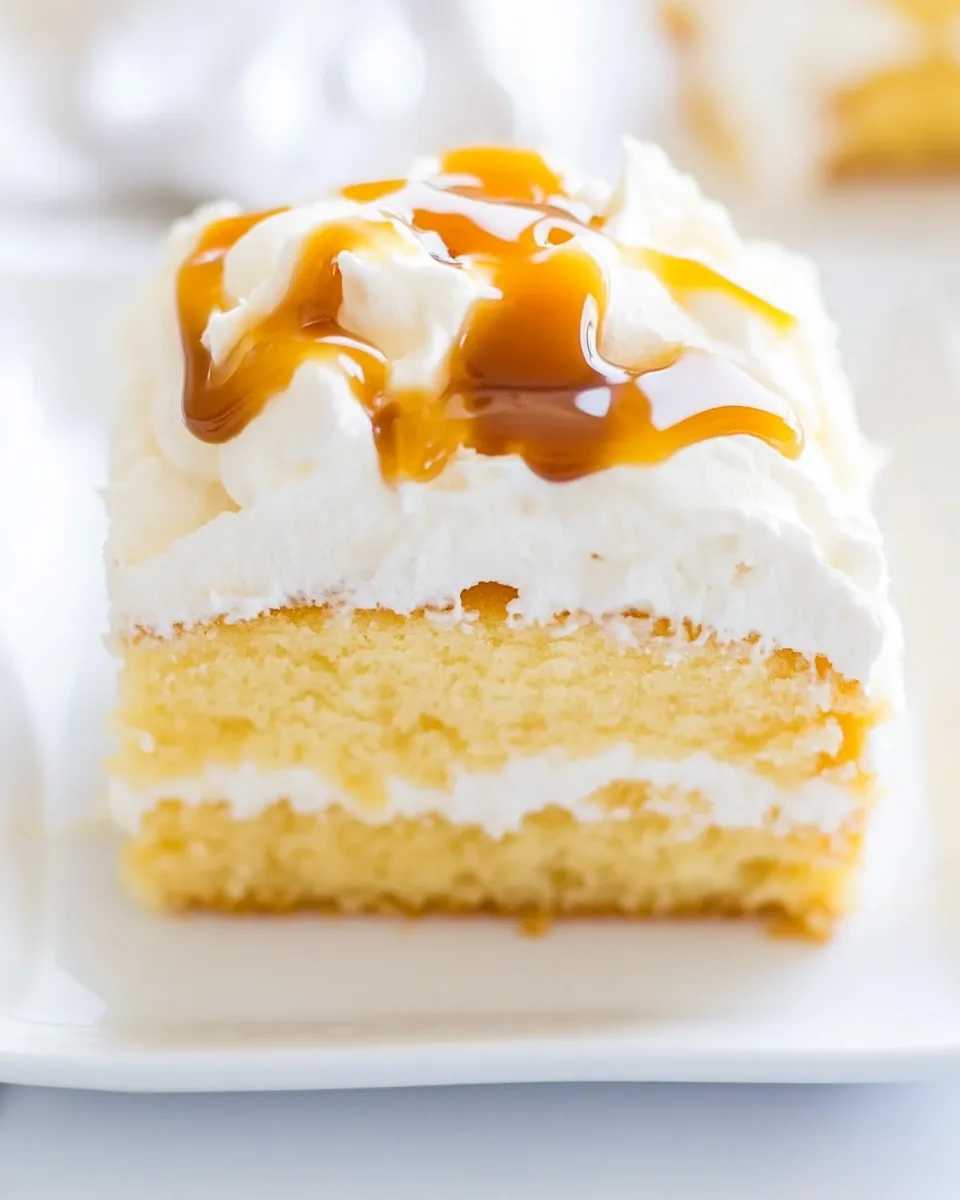 Delicious Caramel Cream Poke Cake shot