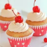 Delicious Cherry-Filled Almond Cupcakes photo