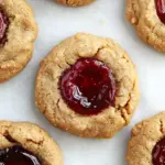 Homemade Flourless Peanut Butter and Jelly Thumbprint Cookies photo