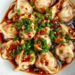 Homemade Spicy Wontons In Chili Oil photo