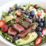 Homemade Steak Salad with Berries, Avocado and Goddess Dressing photo