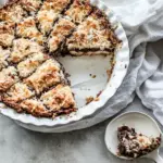 Homemade Warm Toasted Caramel Coconut Gooey Chocolate Crunch Bars. photo