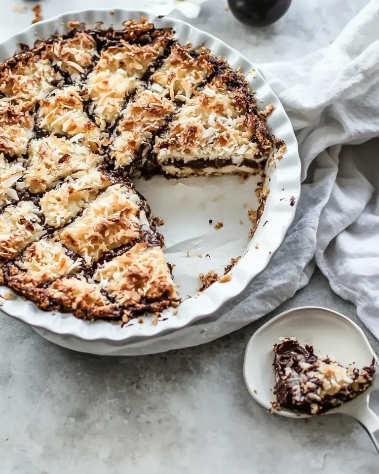 Homemade Warm Toasted Caramel Coconut Gooey Chocolate Crunch Bars. photo